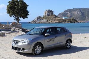 a small silver car parked on the beach at Panorama Studios in Kefalos