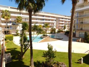 The swimming pool at or close to GMID IMMO A187 Apartamento Port Canigo