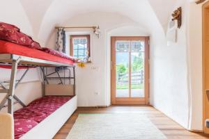 A bed or beds in a room at Maso La Marianna