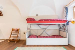 A bed or beds in a room at Maso La Marianna