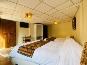 Letto o letti in una camera di Hostal Alcala