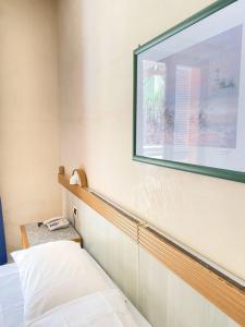 Voodi või voodid majutusasutuse Tramonti Residence toas