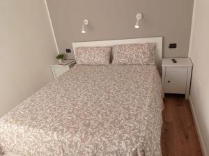 Posteľ alebo postele v izbe v ubytovaní Monopoli guest house BA07203091000019440