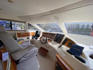 a view of the cockpit of a boat at Luxury Italian Motor Yacht in Hamble