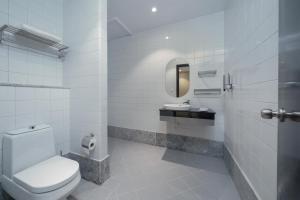 Koupelna v ubytování Biz Hotel Apartments