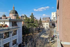 a view of a city street from a building at Lux Apartment Rose in Kragujevac
