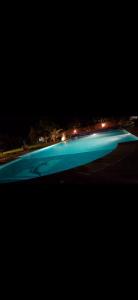 a night view of a beach with blue water at Villa privée Wafa in Marrakesh