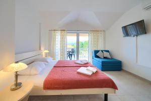 Postel nebo postele na pokoji v ubytování Apartments Ivica Krk Island