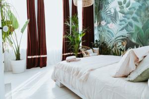 Кровать или кровати в номере Musa Antwerp