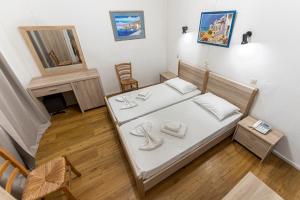 Postel nebo postele na pokoji v ubytování Sparta Team Hotel