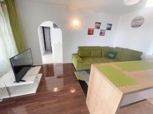 TV a/nebo společenská místnost v ubytování Apartmani Fabijan&Florijan