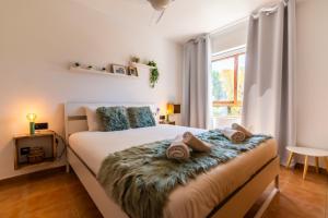 Postel nebo postele na pokoji v ubytování Renteando Albir Apartments + 37 fotografií