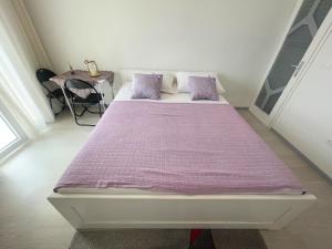 Postel nebo postele na pokoji v ubytování Apartmani Fabijan&Florijan