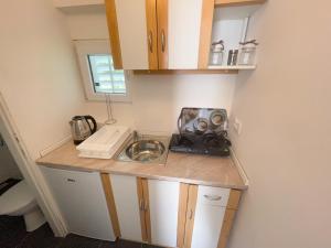 Kuchyň nebo kuchyňský kout v ubytování Apartmani Fabijan&Florijan