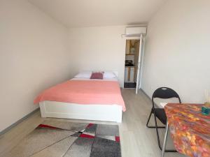 Postel nebo postele na pokoji v ubytování Apartmani Fabijan&Florijan