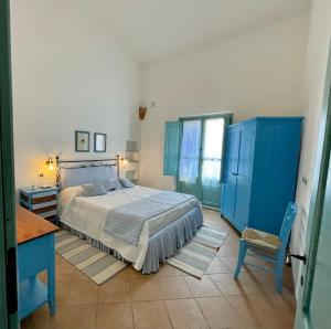 Кровать или кровати в номере La casetta turchese +79 фотографий