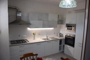 Kuchyň nebo kuchyňský kout v ubytování Casa Riviera