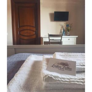 Televízia a/alebo spoločenská miestnosť v ubytovaní L' Antica Trebbia - Rooms