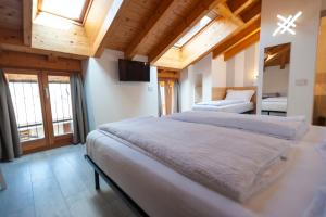 Postel nebo postele na pokoji v ubytování B&B da Sabry e Gian