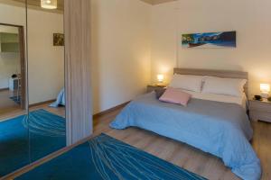 Posteľ alebo postele v izbe v ubytovaní Siciliabedda Catania Holiday House