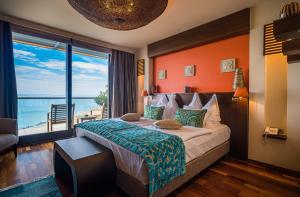 Posteľ alebo postele v izbe v ubytovaní Mala Garden Design Hotel + 37 fotografií