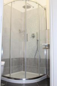 Koupelna v ubytování SunnyCornerinRHome + 20 fotografií