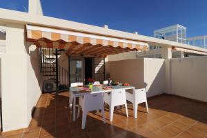 Balkón alebo terasa v ubytovaní Ohana Beachfront