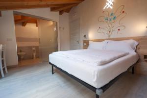 Postel nebo postele na pokoji v ubytování B&B da Sabry e Gian