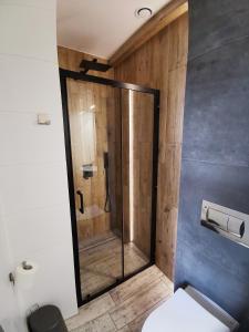 Kúpeľňa v ubytovaní Apartamenty Majówka