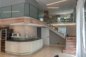 Кухня или мини-кухня в Hotel Graziella
