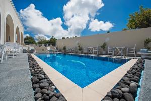 Bazén v ubytování Alizea Villas & Suites nebo v jeho okolí