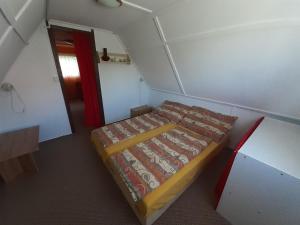Postel nebo postele na pokoji v ubytování Chata u lesa