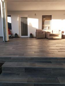 Posezení v ubytování Éva Apartman