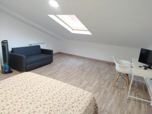 Telewizja i/lub zestaw kina domowego w obiekcie Edificio Valles del Lúpulo (DUPLEX)