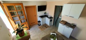 Kuchyň nebo kuchyňský kout v ubytování Sonniges Eck Ferienwohnung 1