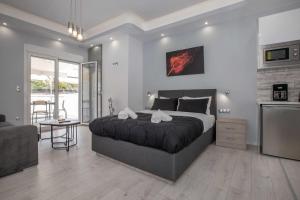 Posteľ alebo postele v izbe v ubytovaní Studio penthouse near Acropolis Museum by GHH