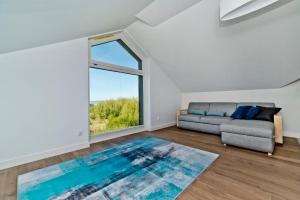 Ruang duduk di BlueApart Apartamenty Na Plaży Jastarnia