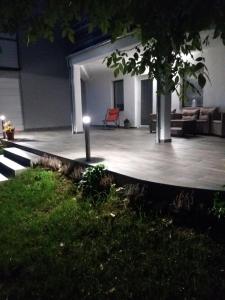 Zahrada ubytování Éva Apartman