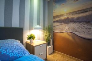 Posteľ alebo postele v izbe v ubytovaní Noclegi Miodowa Near By The Beach Gdynia – Orłowo