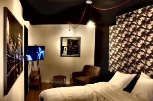 Letto o letti in una camera di Barotel - Bed & Dinner