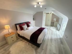 Voodi või voodid majutusasutuse Drumlanaught Cottage Farnham toas