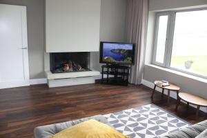 Televiisor ja/või meelelahutuskeskus majutusasutuses Sea Vista - Rathmullan