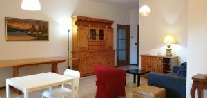 a living room with a couch and a table at Sant'Ermete in Matino