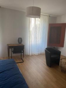 Postel nebo postele na pokoji v ubytování Chambres et table d'hôtes Le cèdre Aveyron