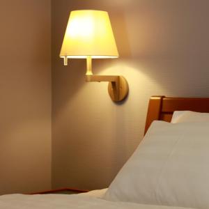 Posteľ alebo postele v izbe v ubytovaní Vita Apartmanok