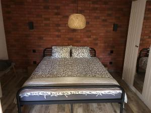 Posteľ alebo postele v izbe v ubytovaní Apartamenty Chris