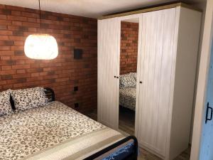 Posteľ alebo postele v izbe v ubytovaní Apartamenty Chris