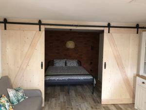 Posteľ alebo postele v izbe v ubytovaní Apartamenty Chris