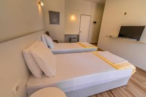 TV a/nebo společenská místnost v ubytování Hotel NEBO