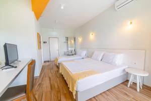 Postel nebo postele na pokoji v ubytování Hotel NEBO